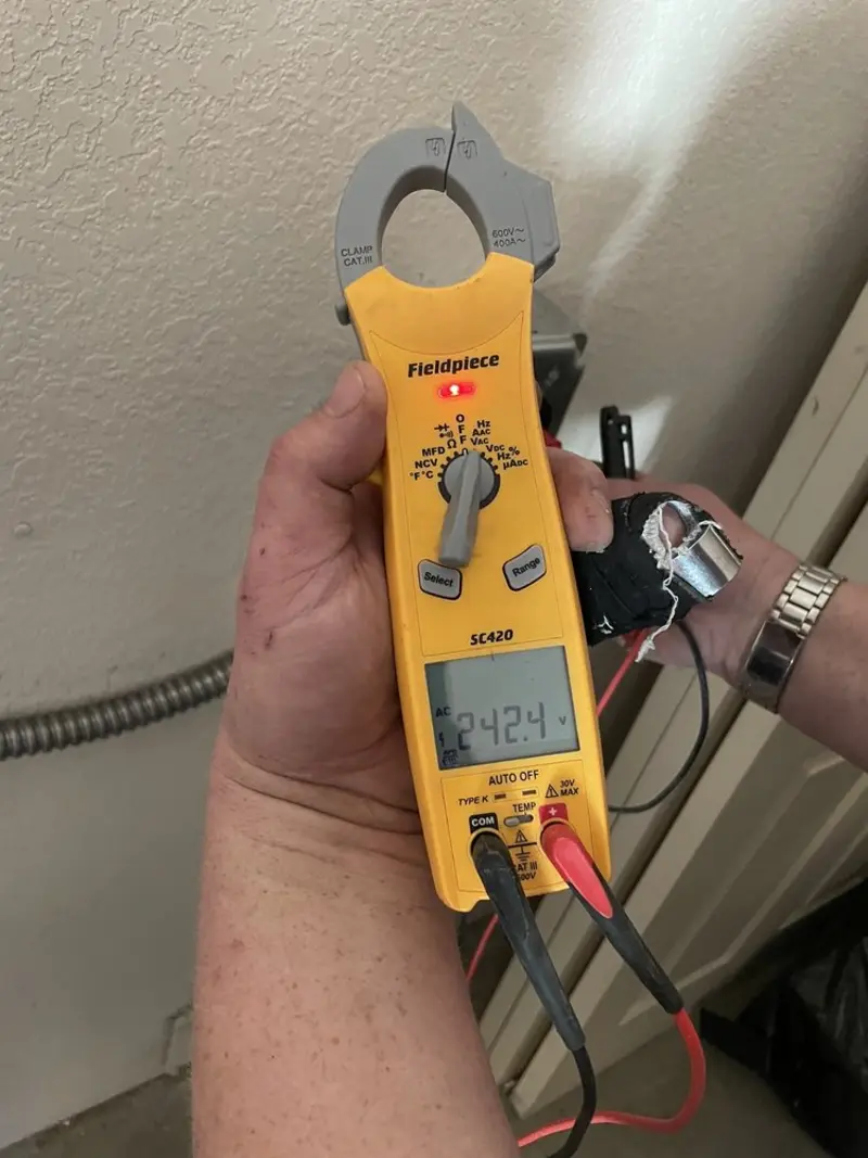 Voltage testing with clamp meter during Generator Installation in Country Club